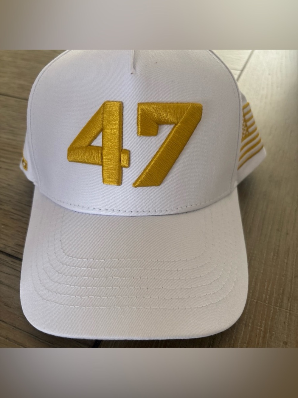 White TPUSA Cap  Gold '47' And Gold Embroidered American Flag. NEW